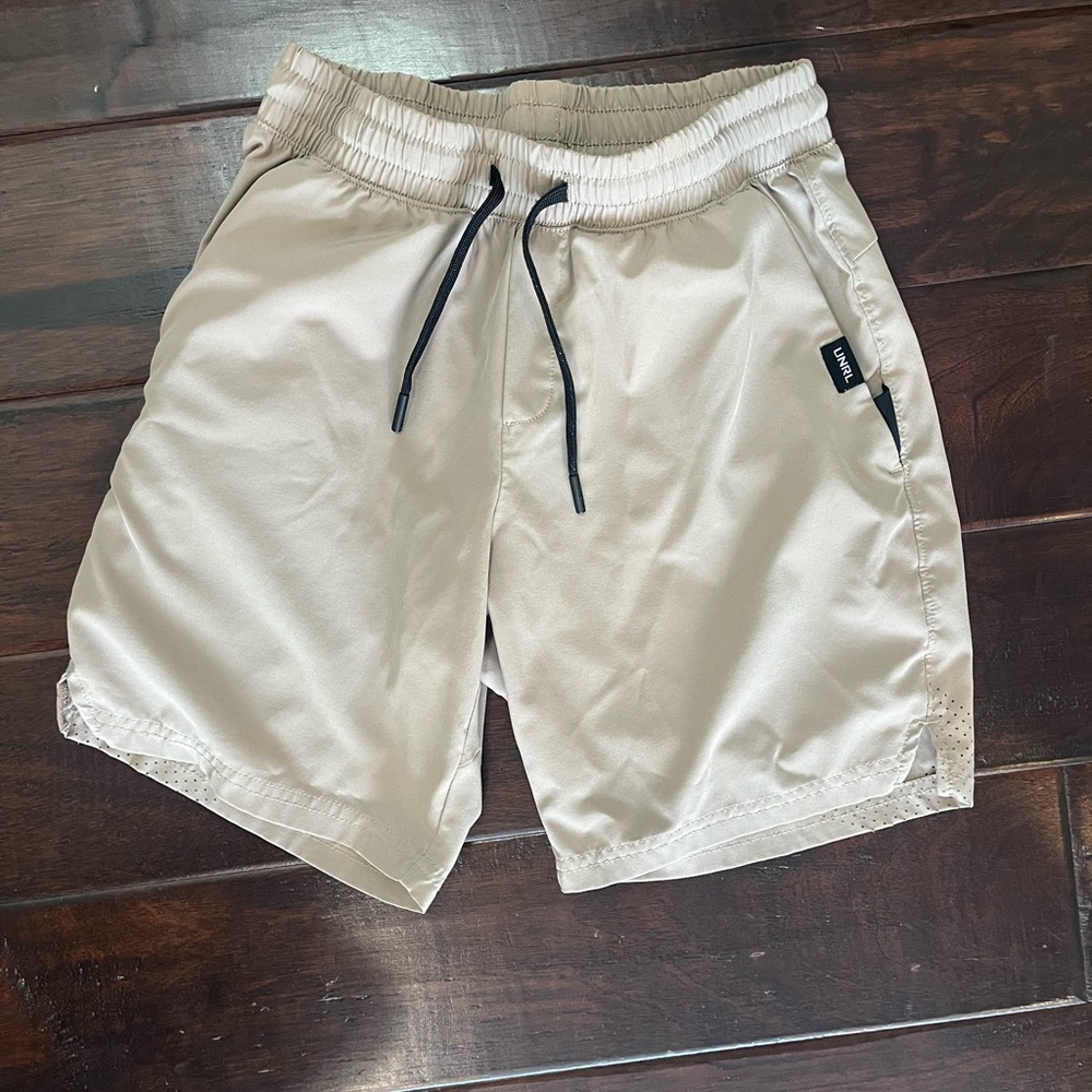 Boys tan size large UNRL shorts.